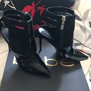 Bebe Black Pointy Toe Cutout Pumps